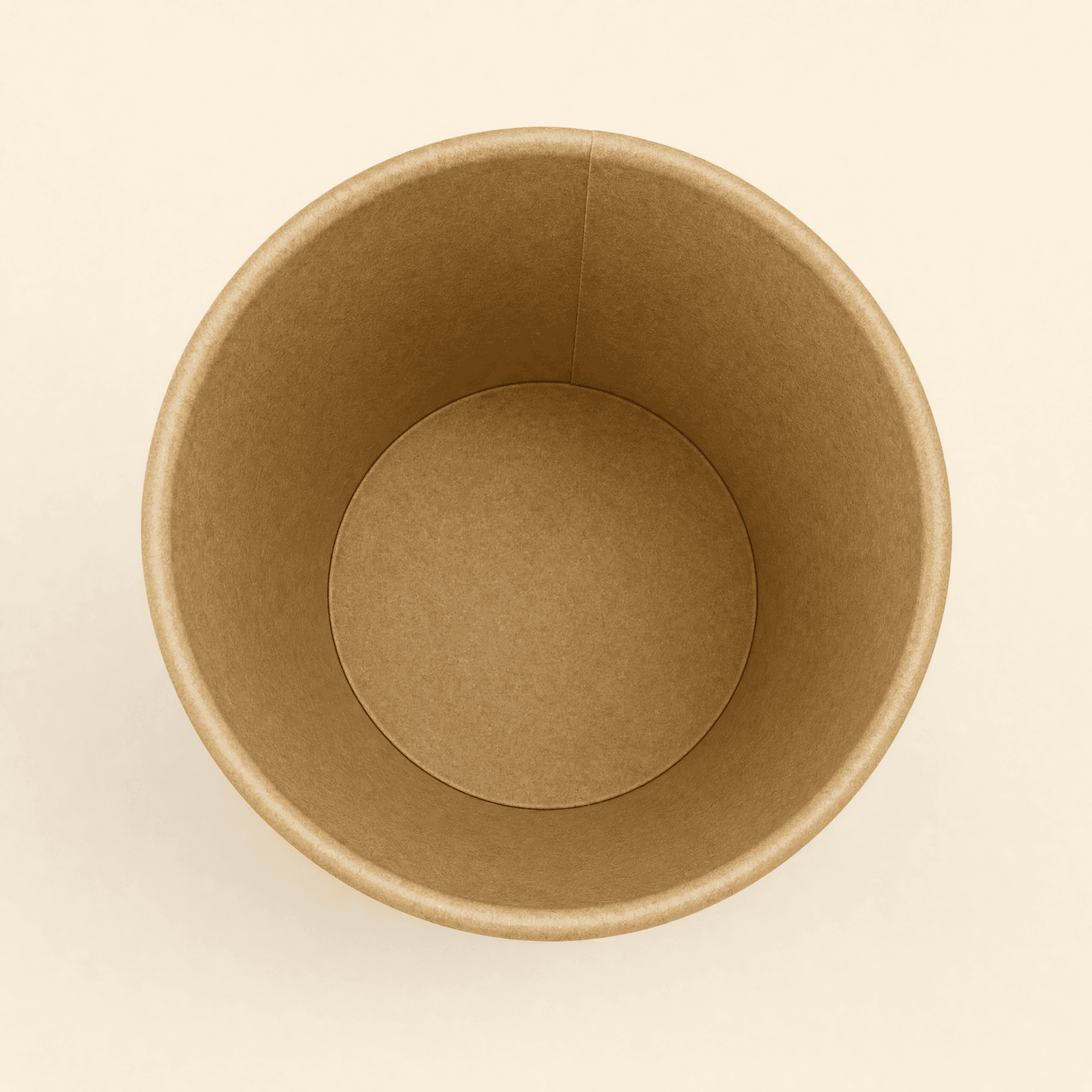 Top-down view into the empty kraft hot cup showing the rolled rim and kraft interior