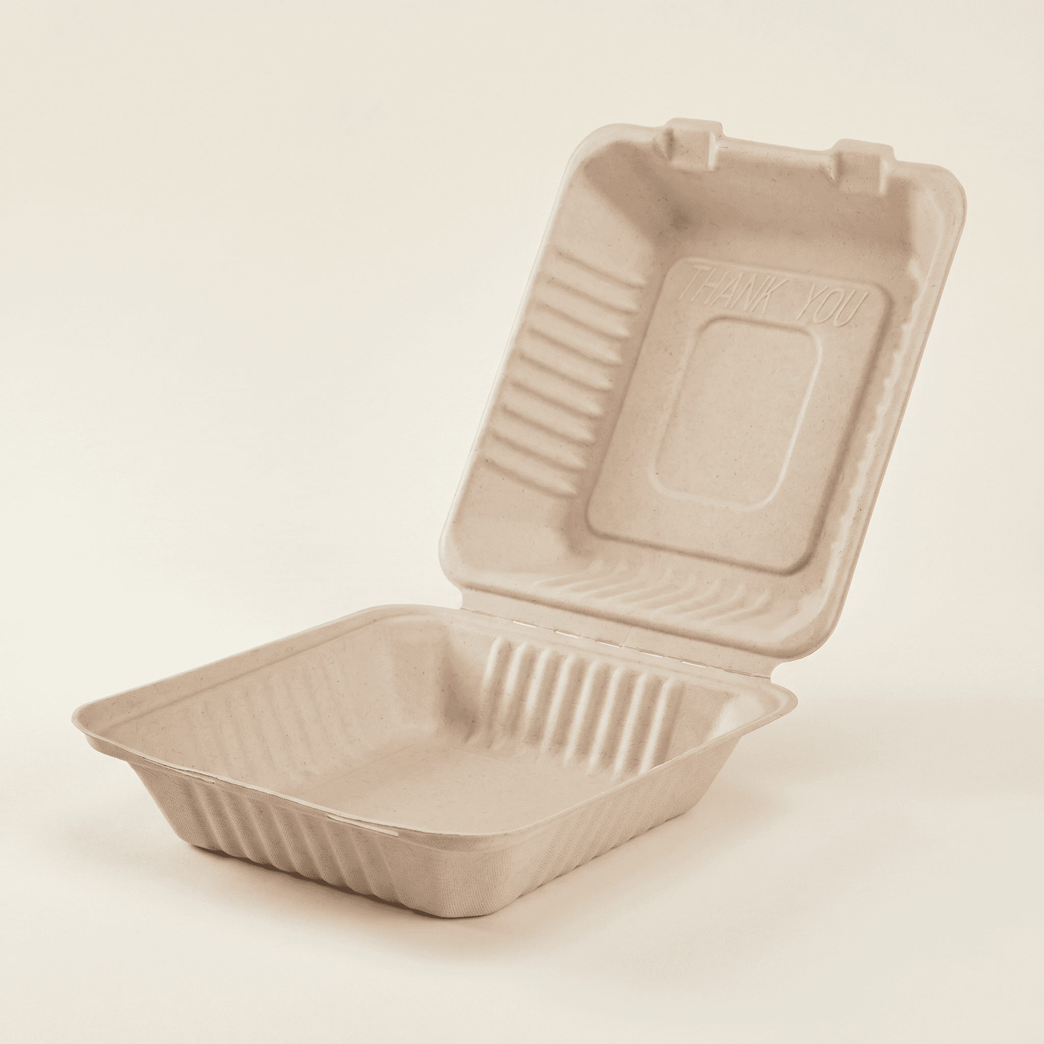 8×8 single-compartment bagasse clamshell, lid open at a three-quarter angle showing the deep single compartment and the embossed THANK YOU lid