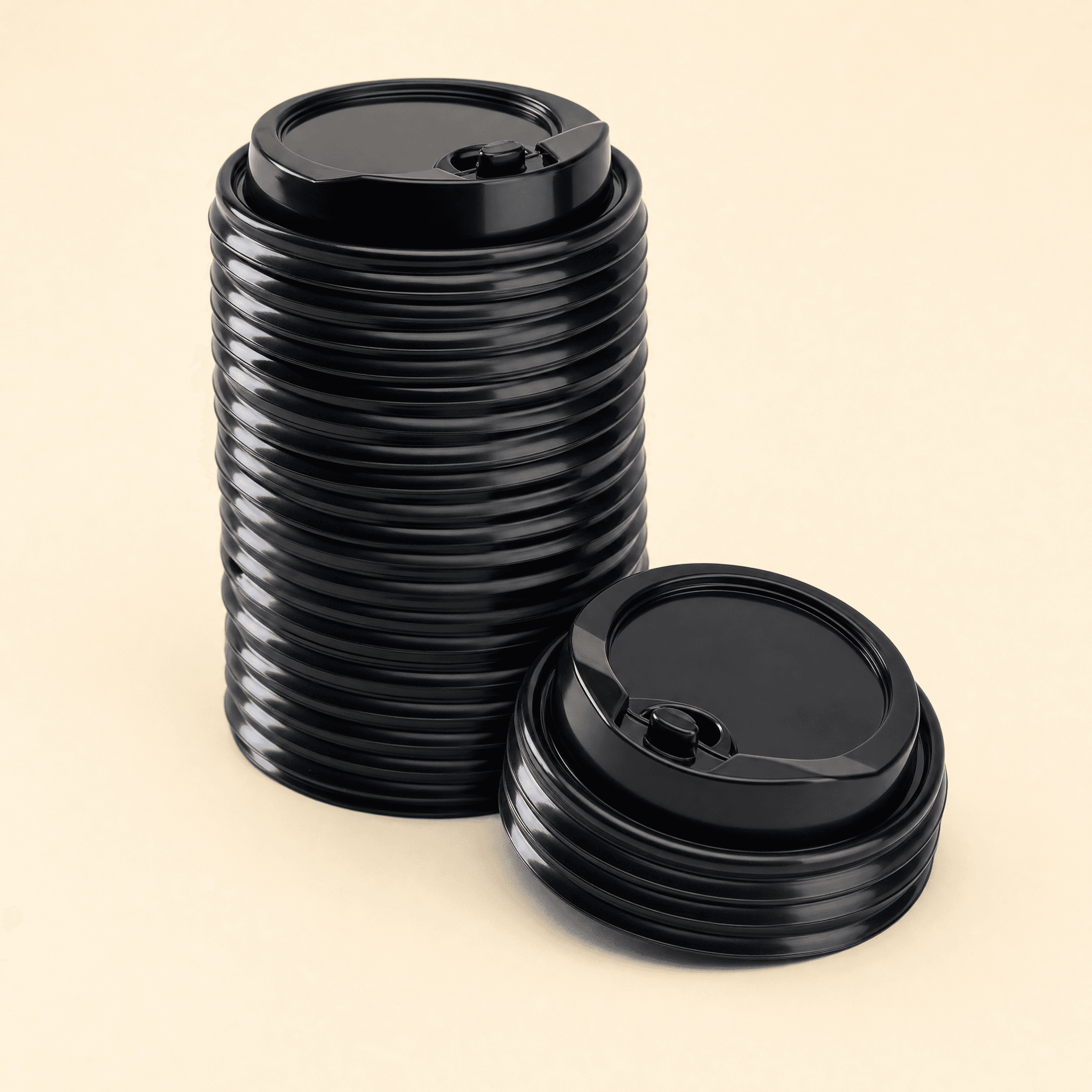 A tall stack of black PP dome coffee cup lids, showing they are sold in bulk by the case