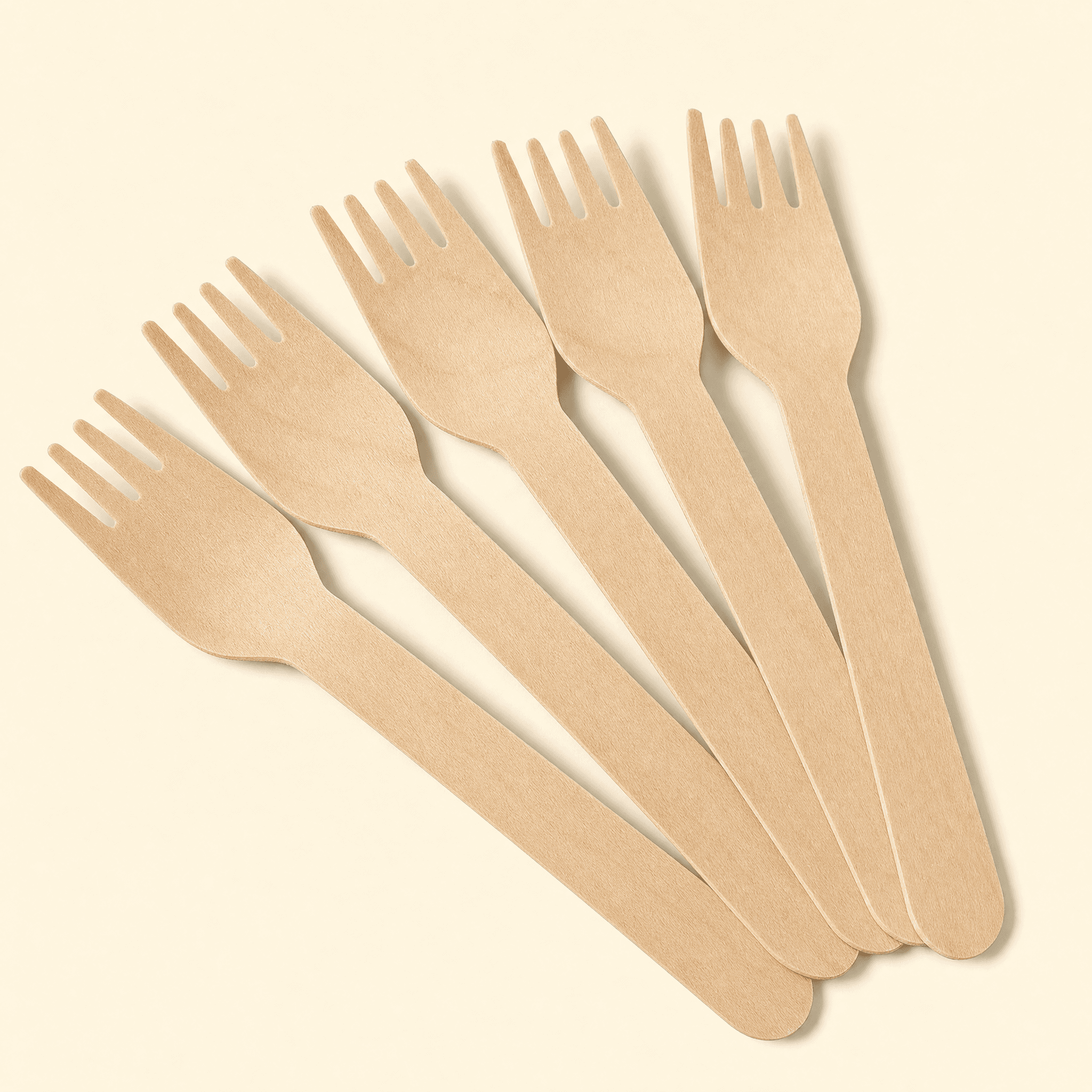 Five identical birch forks fanned out in a row, showing they are sold in bulk by the case